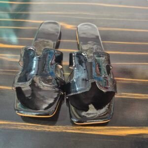 patent black h strap slides are the ultimate blend of high fashion